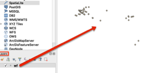Image is a screenshot that shows an arrow pointing from the layers panel with the wf layer to the points in the workspace